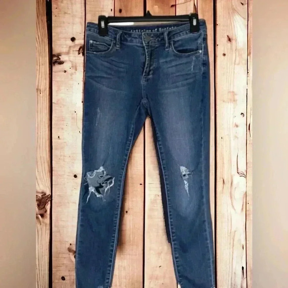 Articles of Society size 25 ripped skinny jeans with frayed bottoms. - Picture 1 of 6